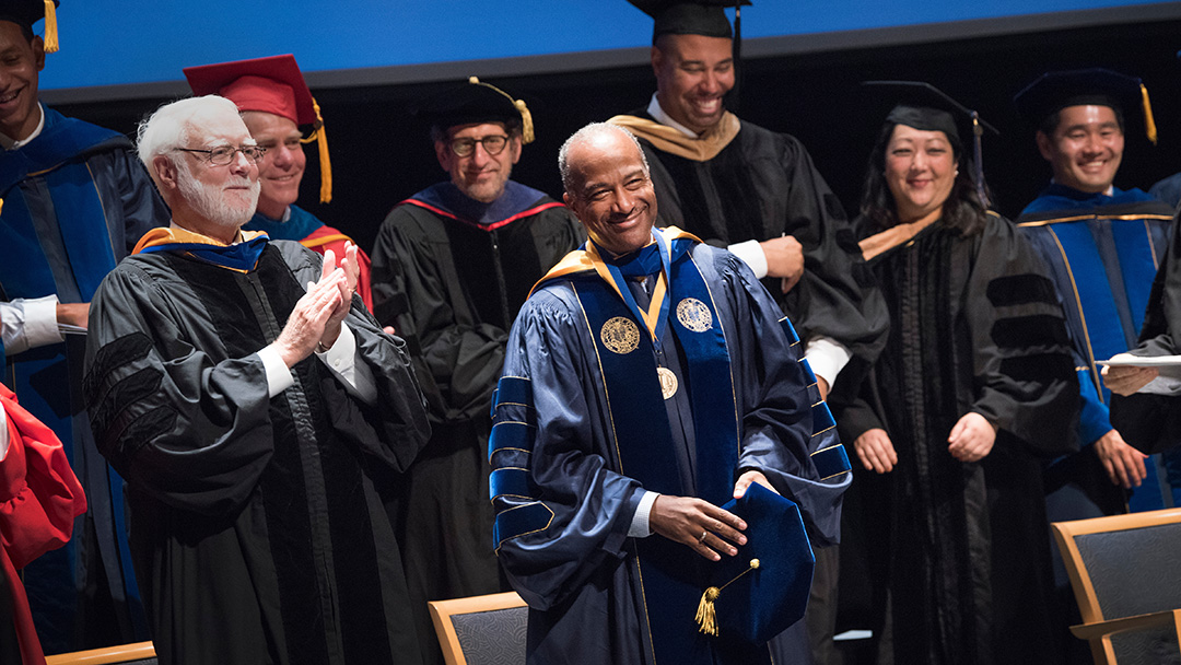 Chancellor Investiture in gown onstage