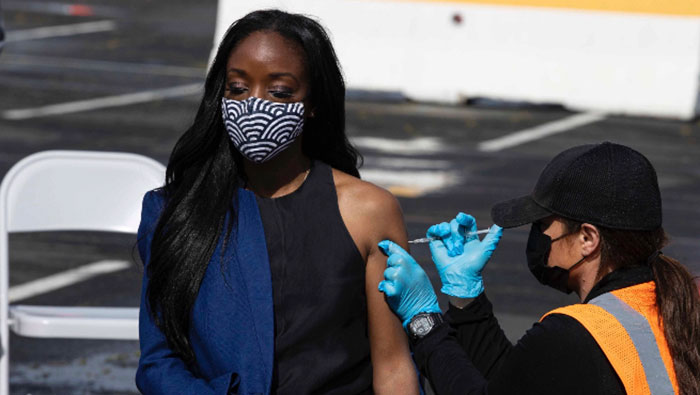 CA Surgeon General Nadine Burke Harris gets the COVID-19 vaccine.