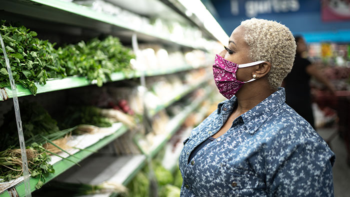 Woman in mask at grocery store