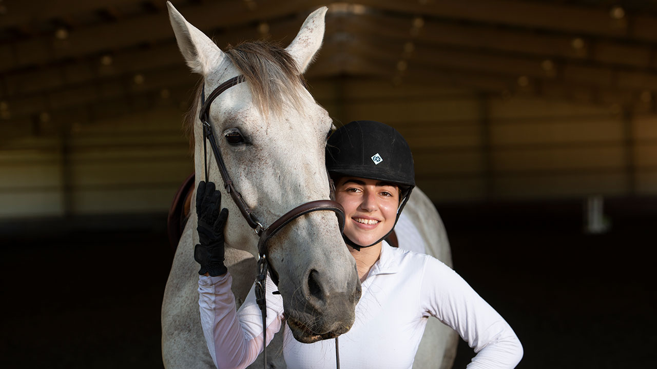 Nina, the boarder horse, with her owner Margo Rosenbaum