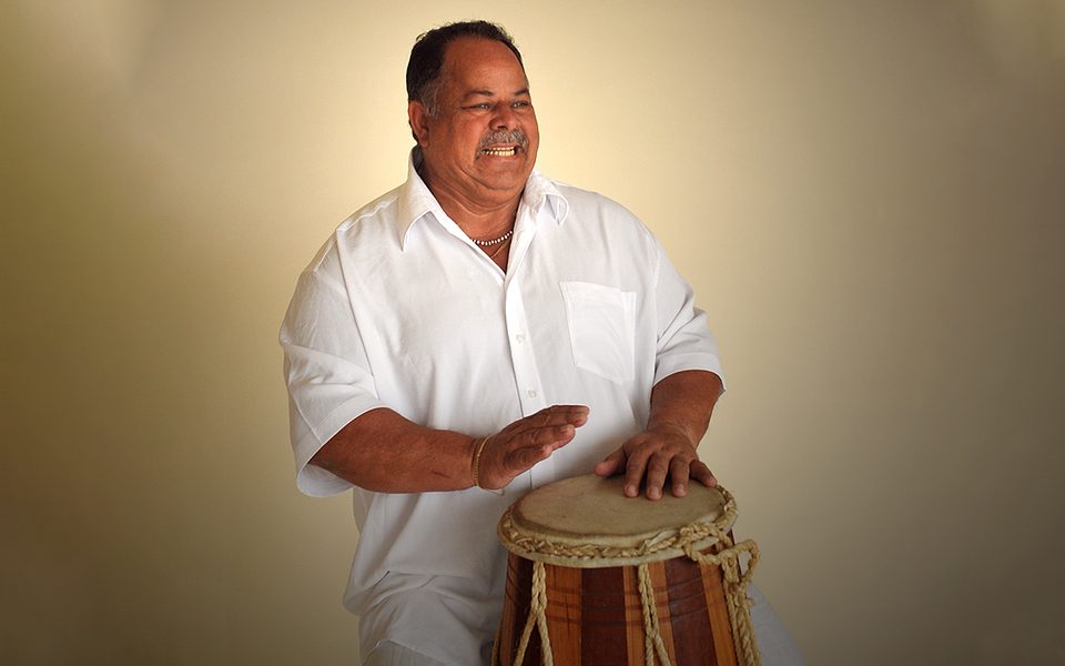 photo of artist with drum