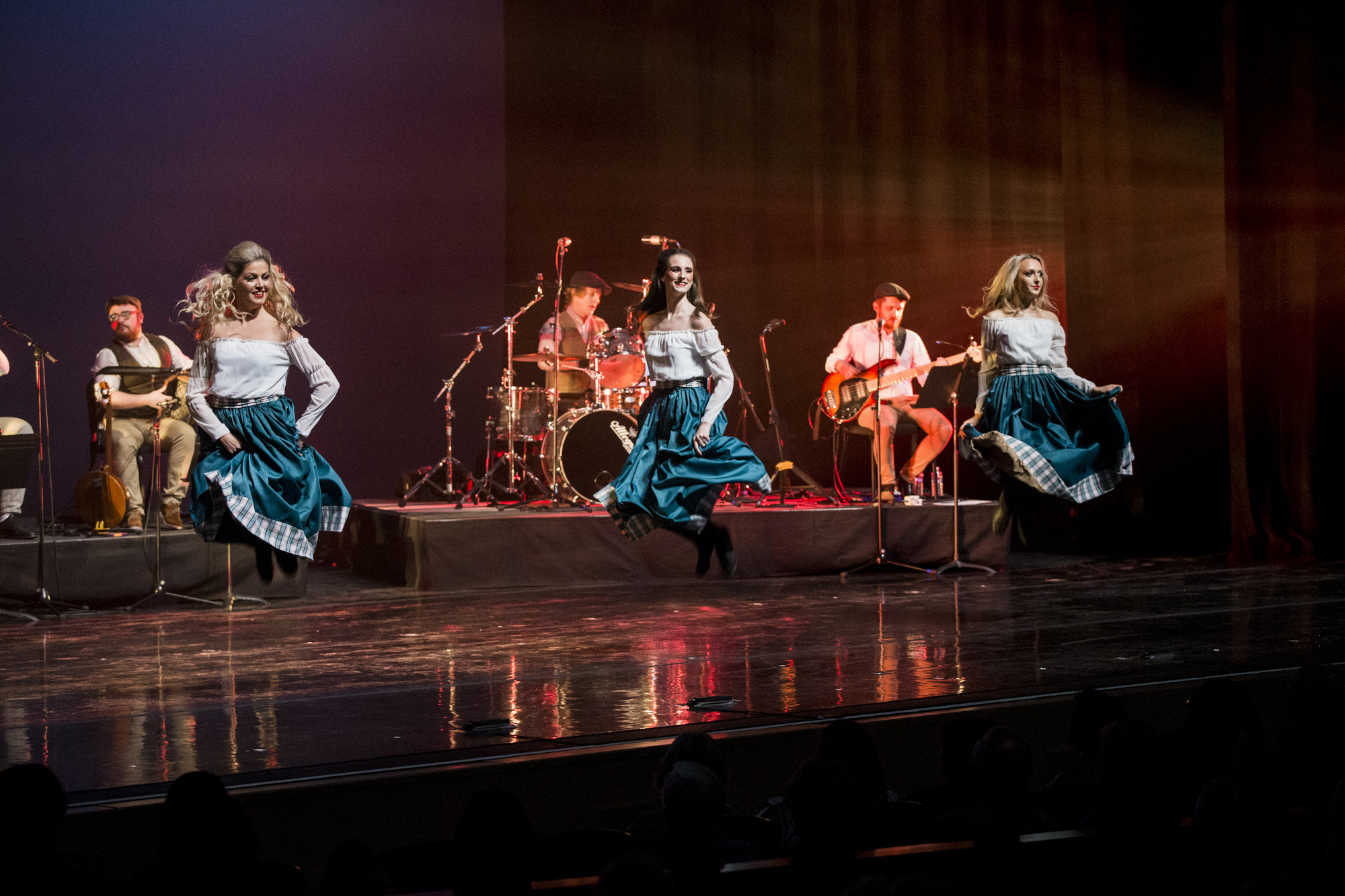 Dancers in traditional costume on stage