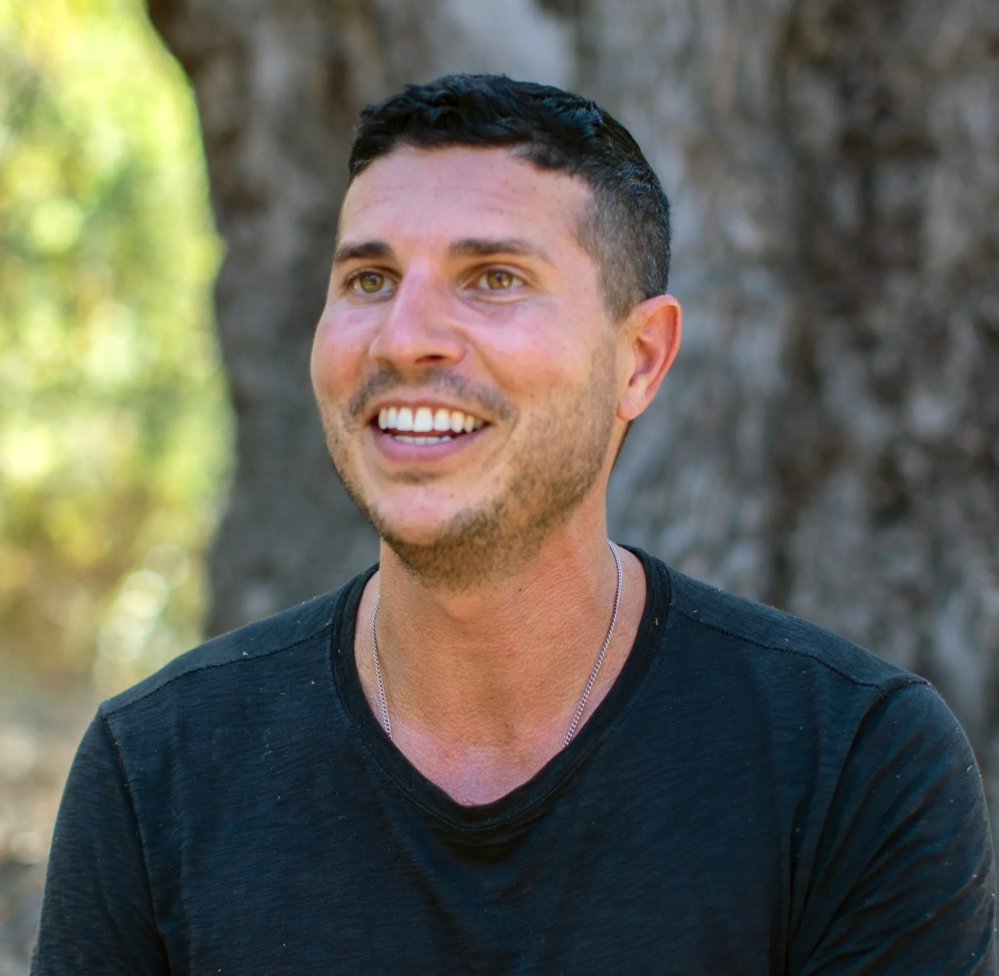 head shot of Gary Bucciarelli in front of tree outside