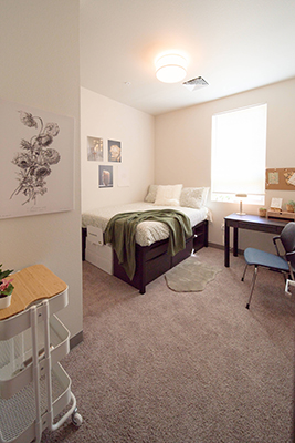 A doorway view of a furnished bedroom