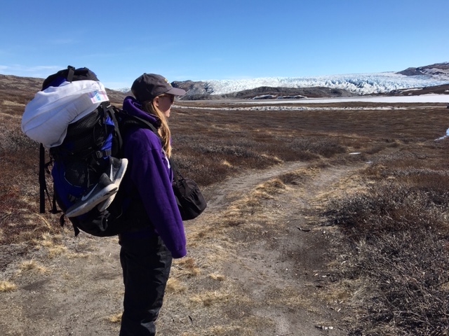 Young woman in Greenland landscape