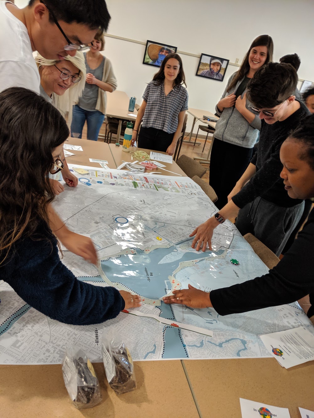 Students play a board game in class at UC Davis. 