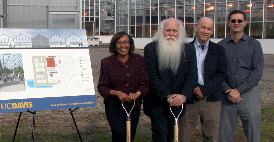 deans of UC Davis in front of greenhouses