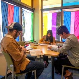 students working at a table 