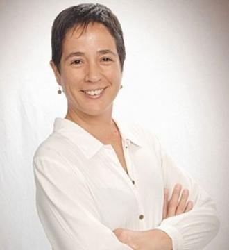 Woman with short hair in white blouse, portrait.