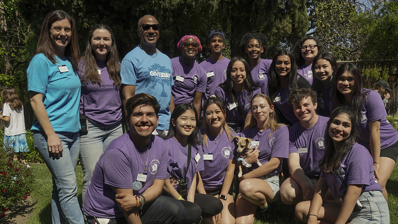 Amanda Portier is photographed with the rest of the Picnic Day board, their advisor, and Chancellor Gary S. May at the end of Picnic Day 