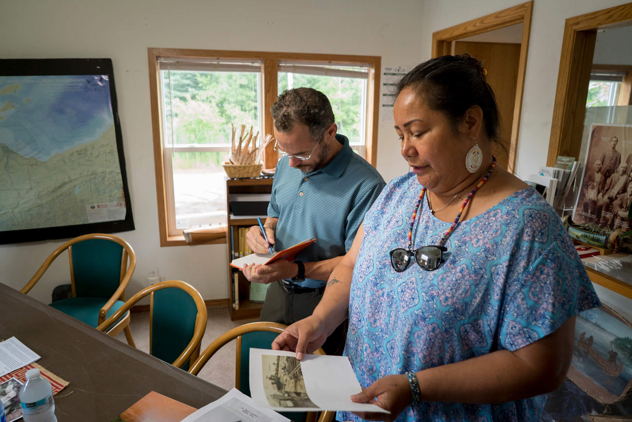 Pinter takes notes as Tribal Historic Preservation Officer Edith Leoso discusses the tribe’s move off the floodplain.