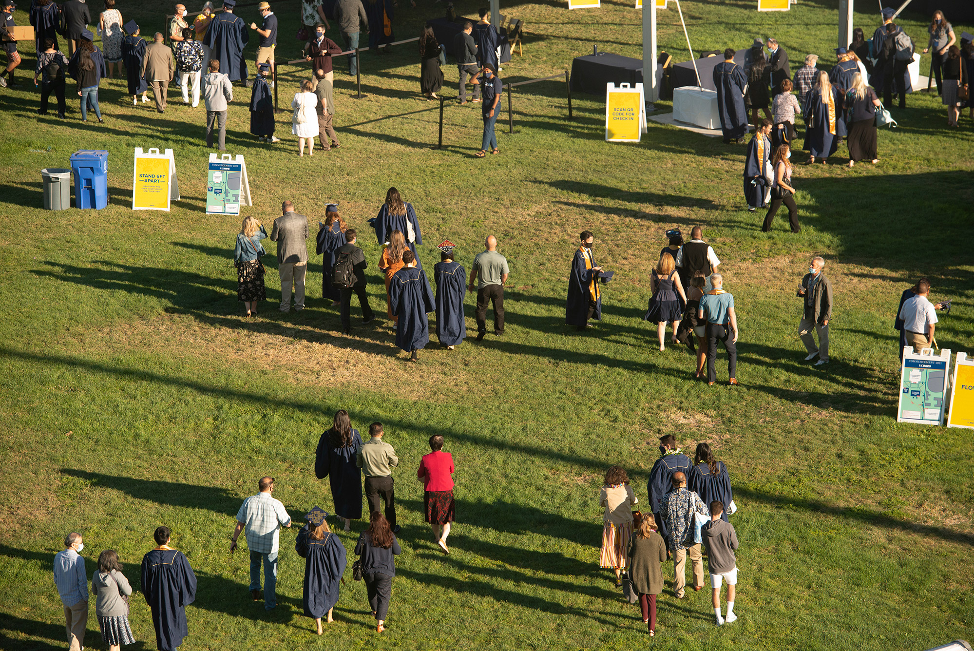 Aerial view of students and parents at graduation.