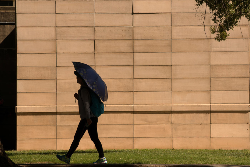 Carrying an Umbrella in the Heat