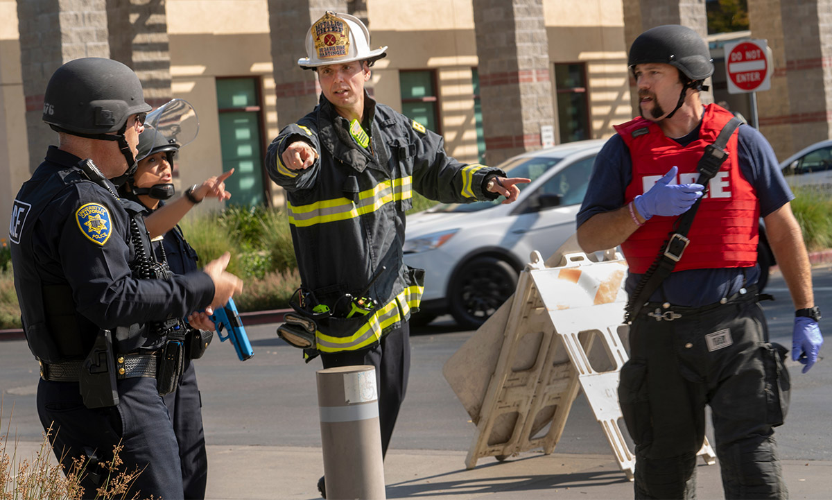 Nathaniel Hartinger gives directions outside the active shooter training.