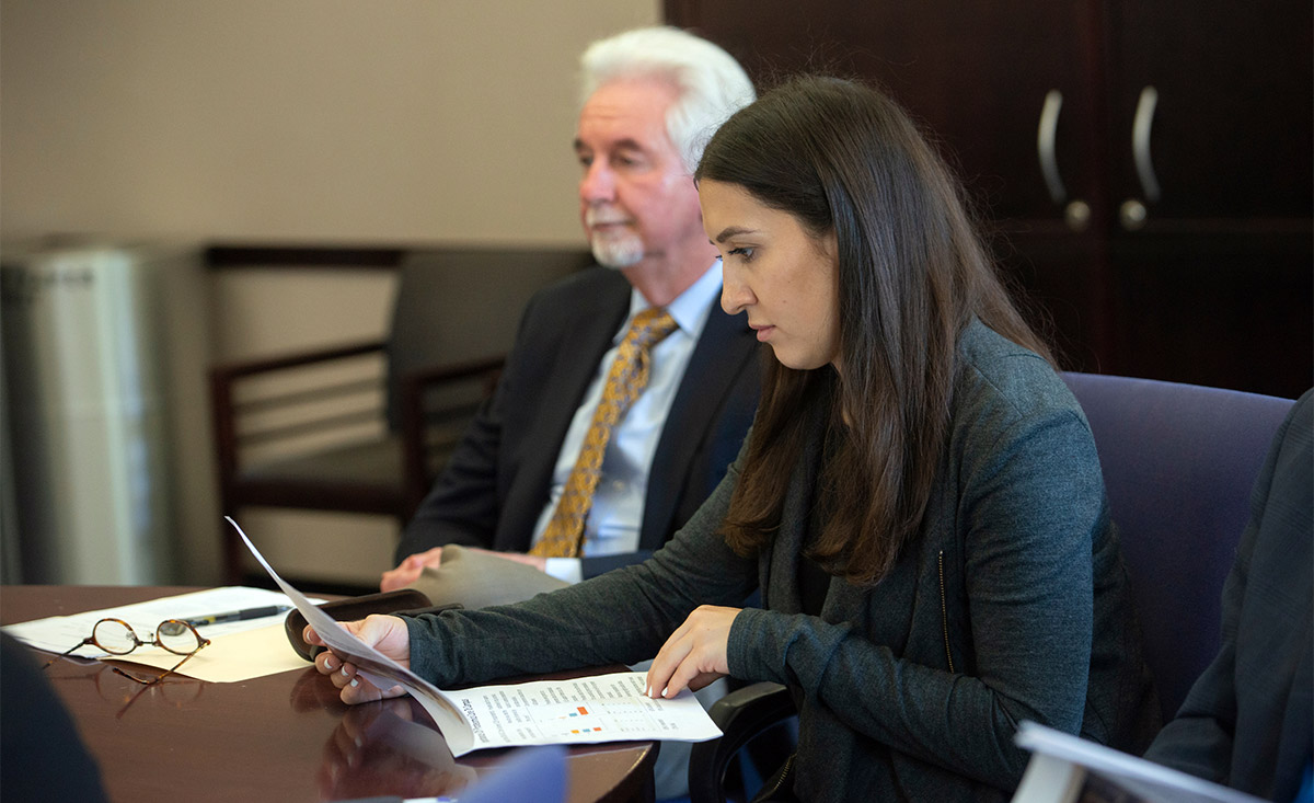 Nadine Mansour shadows Cam Carter at UC Davis.