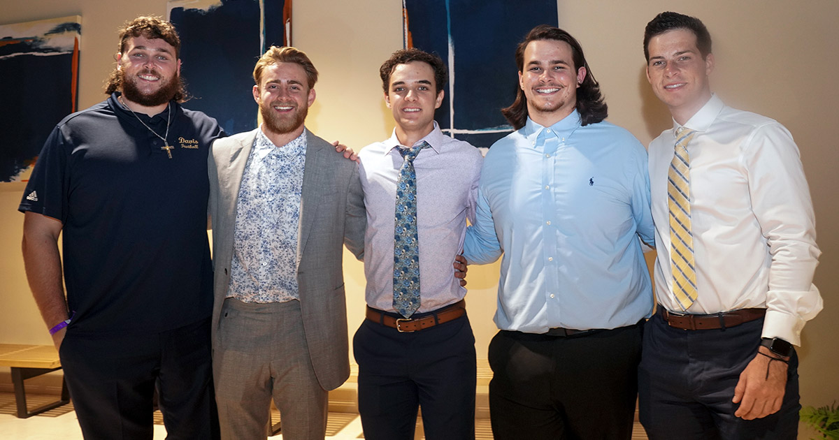 Five students pose for photo