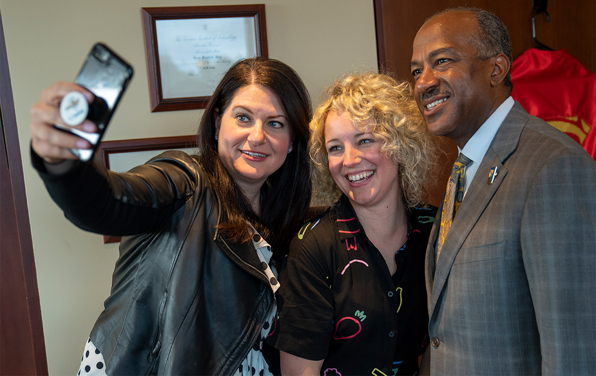 Jaclyn Fromer Cohen, country singer Cam and Chancellor Gary S. May.