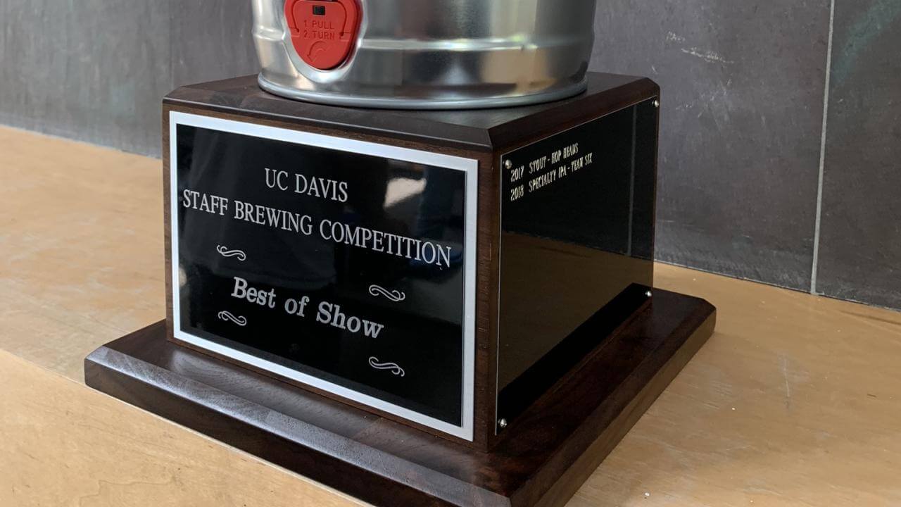 A staff brewing trophy