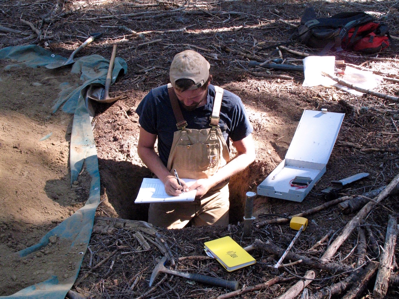 scientist samples soil and rocks