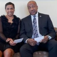 Chancellor May and LeShelle in the Chancellor's Residence sitting on a couch