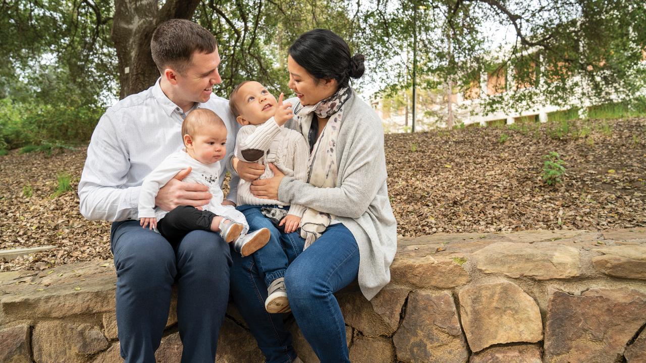 Mom and dad with two young children