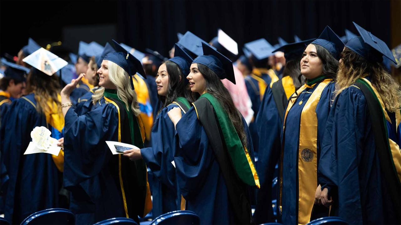 Students in graduation regalia