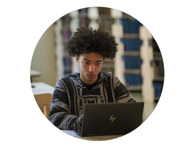 student working on a laptop