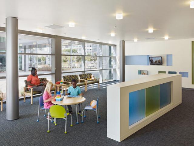 Children playing in a hospital lobby