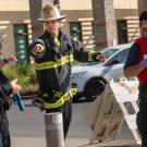 Police and firefighters talk during an emergency exercise.