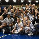 Team celebration photo, on the court.