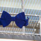 Large blue bow on Mondavi Center's balcony railing