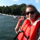 A woman wearing a life jacket