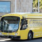 Bus wrapped in Causeway Connection vinyl.