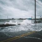 Sea level rise, water over bridge