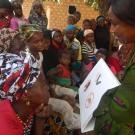 Veterinarian educates residents in Guinea about bats and health. 