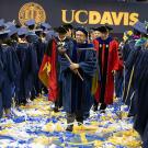 Professor Raymond Rodriguez leads the recession at the College of Biological Sciences&rsquo; commencement