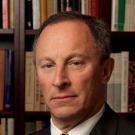 Interim Chancellor Ralph J. Hexter mugshot, books in background