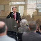 Interim Chancellor Ralph J. Hexter speaks to a crowd.