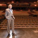 Mondavi Center Executive Director Don Roth stands onstage in Jackson Hall