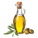 Bottle of oil, leaves and olives