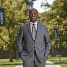 UC Davis Chancellor Gary S. May smiles on the Quad