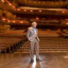 Don Roth, posing, on Mondavi Center stage