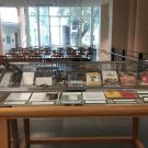 Display case of Chinese cookbooks and menu items