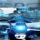 Futuristic rendering of car windshield and dash with floating blue displays