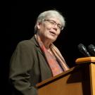 Jessie Ann Owens speaks at podium, UC Davis faculty