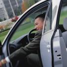 man enters low-carbon transportation car