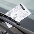 Parking citation under windshield wiper