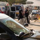 Firefighters and police move between ambulances outside the Mondavi Center during a training exercise.