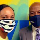 Theanne Griffith and Chancellor Gary S. May, posing, in masks.