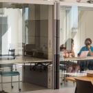 Students speak in glass pod